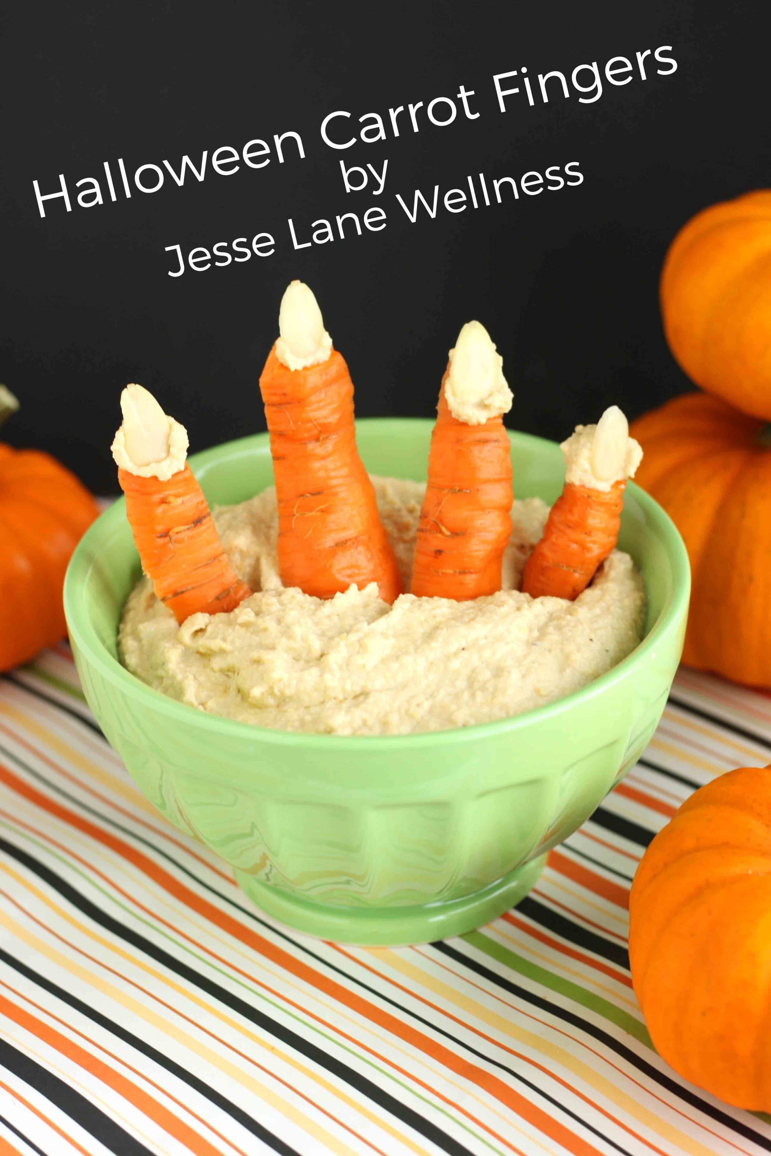 Halloween Carrot Fingers by @jesselwellness #carrots #halloweensnack