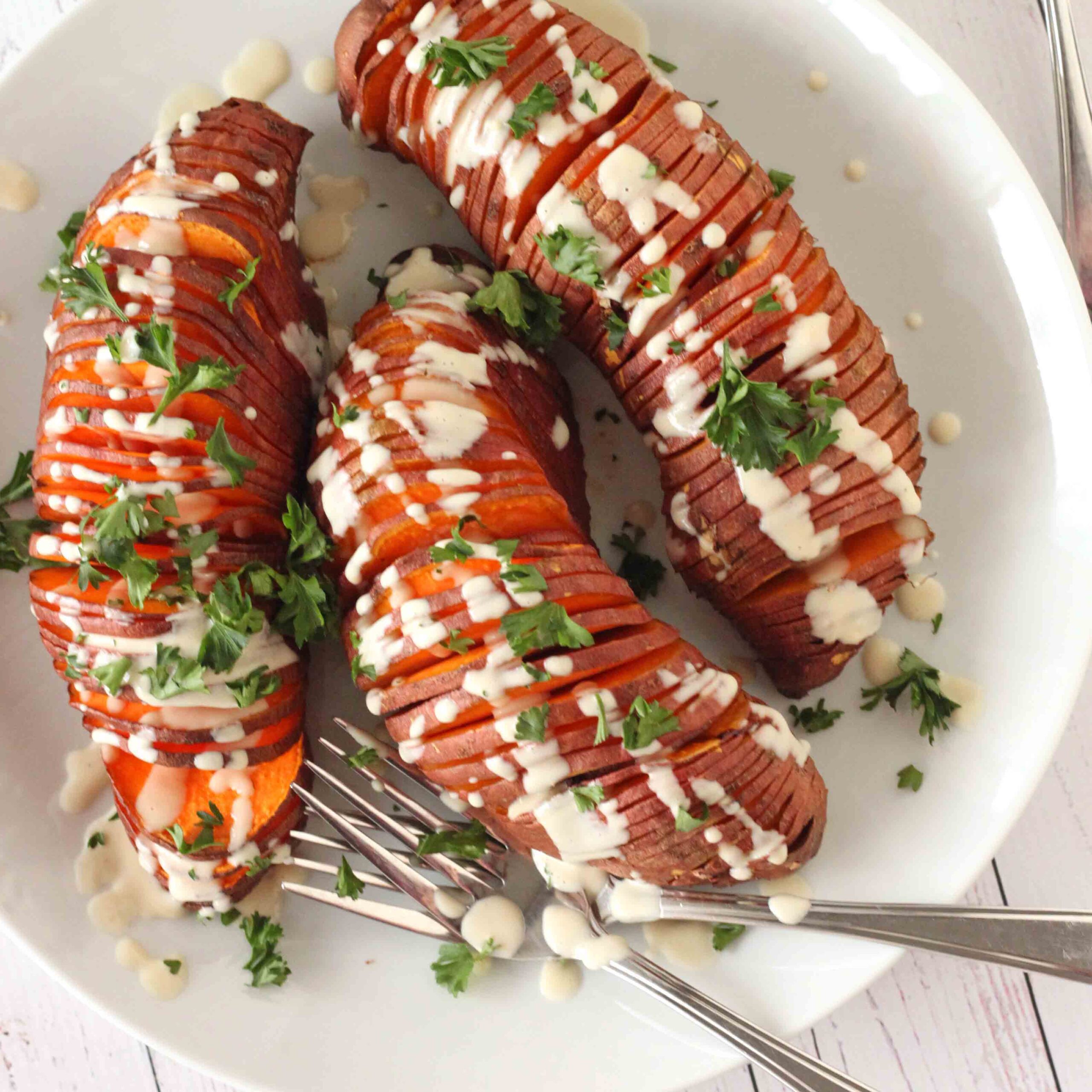 Hasselback Sweet Potatoes with Roasted Garlic Sauce Recipe